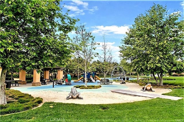 view of community featuring a yard and playground community