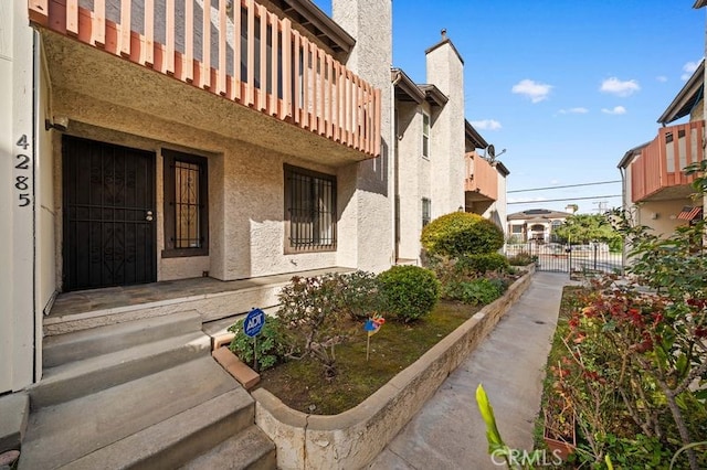 exterior space with a gate and fence