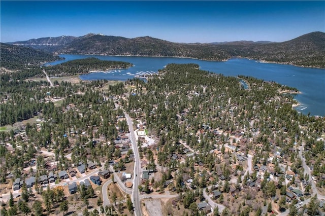 bird's eye view featuring a water and mountain view