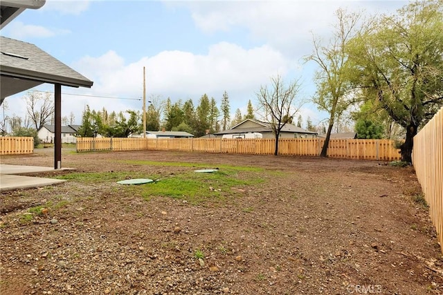 view of yard featuring fence private yard