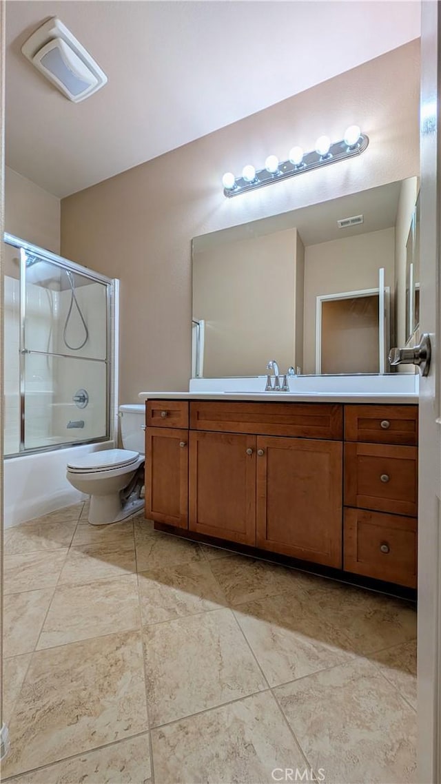 full bath with toilet, combined bath / shower with glass door, vanity, and visible vents