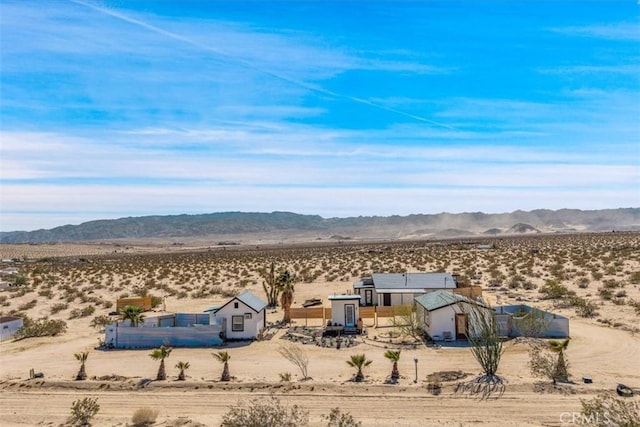 exterior space with a rural view and a desert view