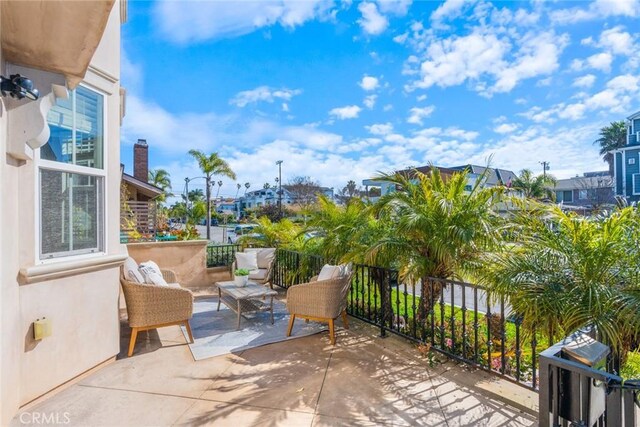 view of patio with a balcony