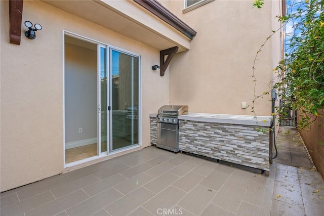 view of patio / terrace with a grill