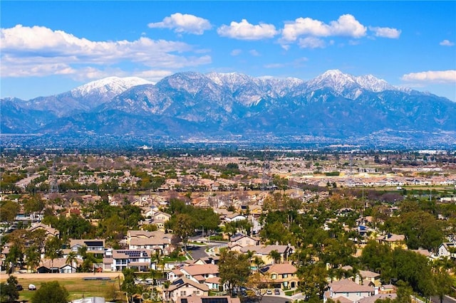 drone / aerial view featuring a residential view and a mountain view