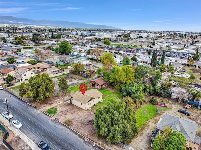 drone / aerial view with a residential view and a mountain view