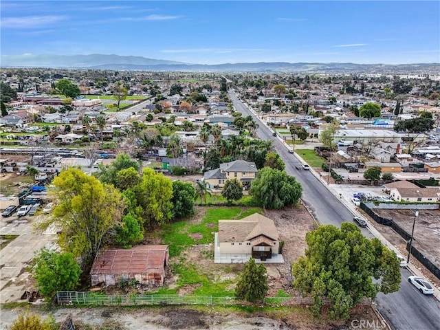 drone / aerial view with a residential view and a mountain view