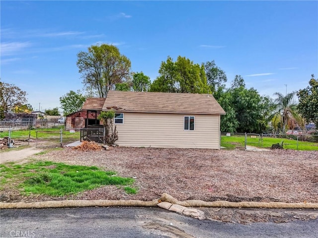 view of front of home with fence