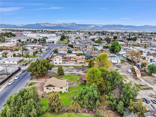 drone / aerial view with a residential view and a mountain view