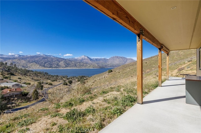 view of mountain feature featuring a water view