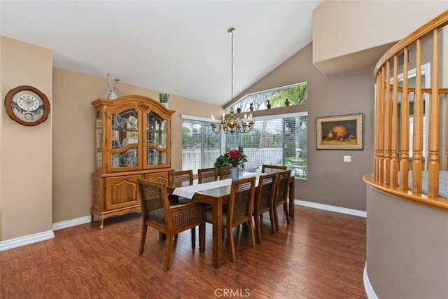 dining space featuring high vaulted ceiling, dark wood-style floors, baseboards, and a chandelier