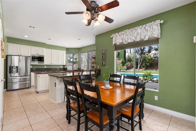 dining room featuring recessed lighting, baseboards, light tile patterned flooring, and a ceiling fan