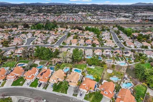 drone / aerial view with a mountain view and a residential view