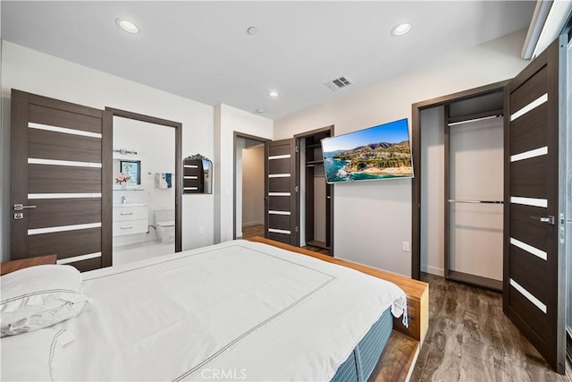 bedroom featuring recessed lighting, visible vents, and dark wood-style floors