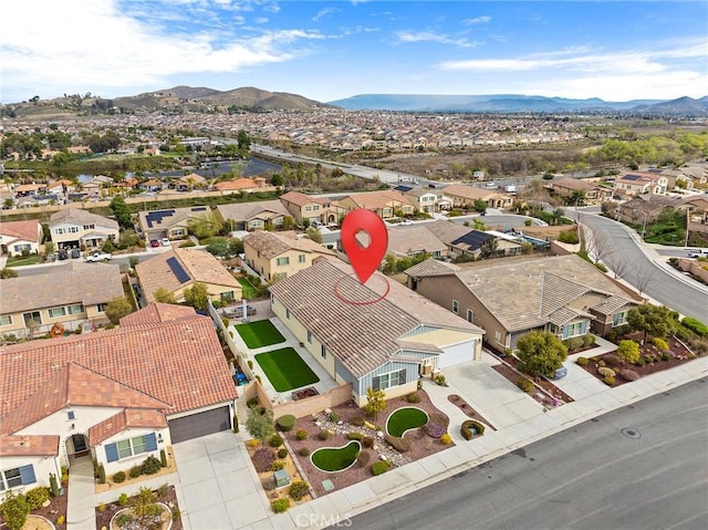 aerial view featuring a residential view and a mountain view