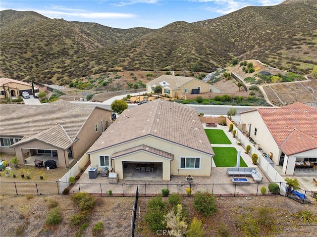 drone / aerial view featuring a mountain view