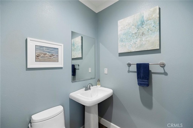 half bathroom with toilet