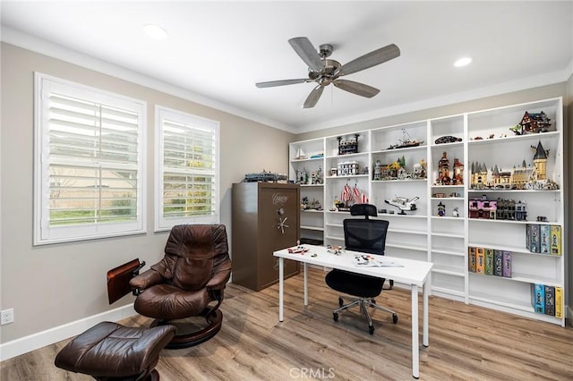 office area featuring a ceiling fan, wood finished floors, baseboards, recessed lighting, and crown molding