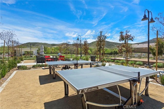 view of patio / terrace with a mountain view