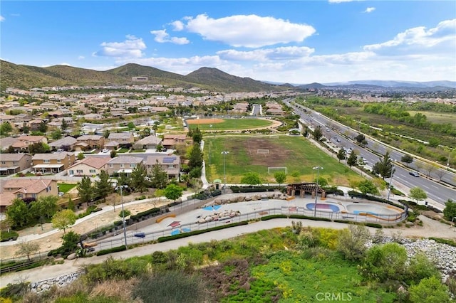 drone / aerial view featuring a mountain view and a residential view