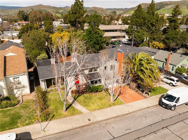 aerial view with a mountain view and a residential view