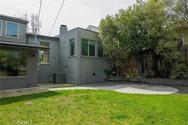 exterior space featuring a patio area and central AC