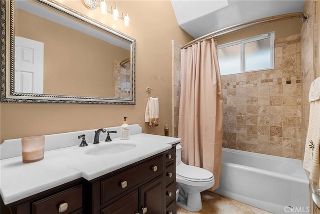 bathroom featuring tile patterned floors, vanity, toilet, and shower / tub combo