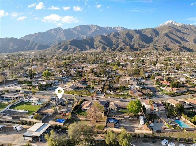 bird's eye view with a residential view and a mountain view