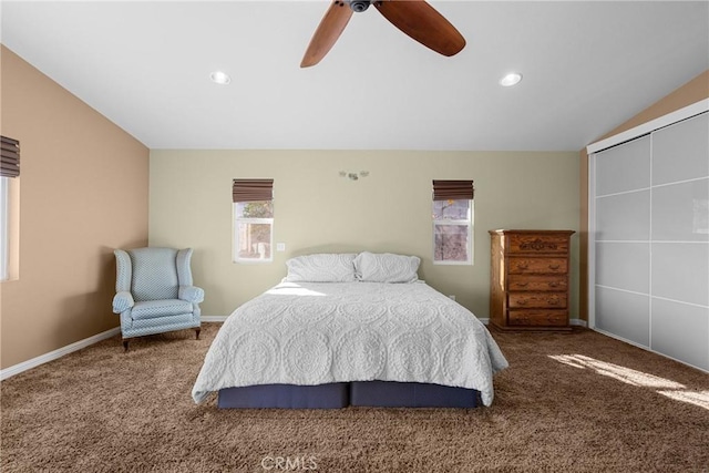 carpeted bedroom featuring lofted ceiling, recessed lighting, a ceiling fan, and baseboards