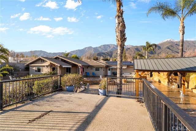 exterior space with a mountain view and a residential view