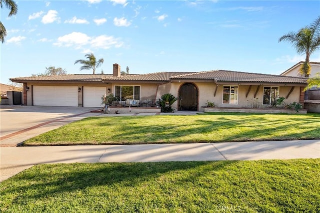 ranch-style house with a front yard, driveway, stucco siding, a garage, and a tiled roof