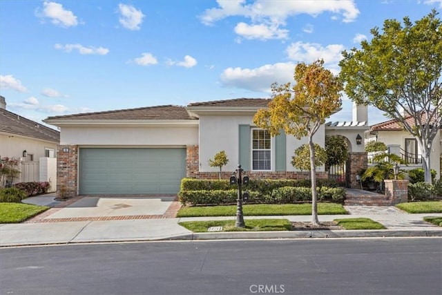 ranch-style house with a garage, brick siding, driveway, and stucco siding