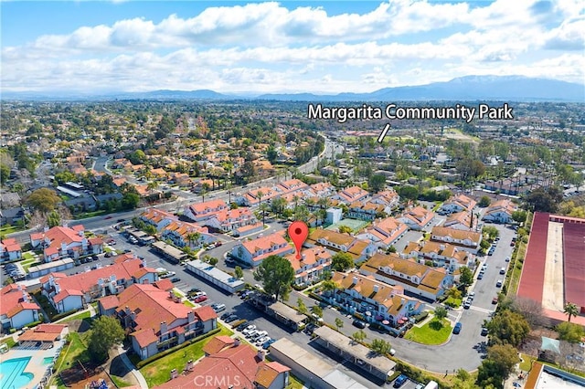 aerial view featuring a residential view and a mountain view