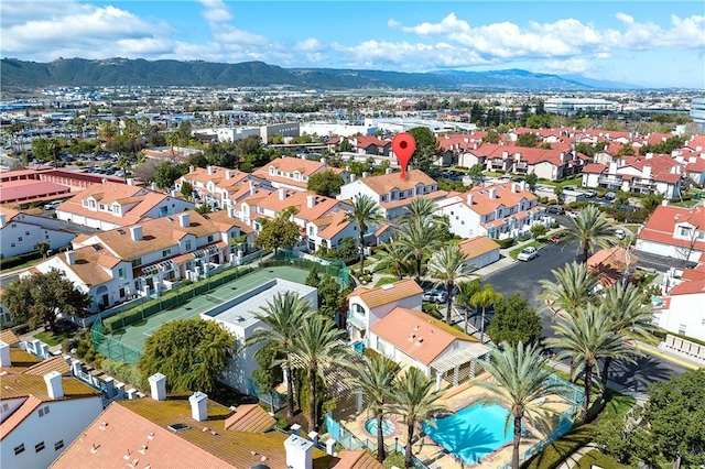 drone / aerial view with a residential view and a mountain view