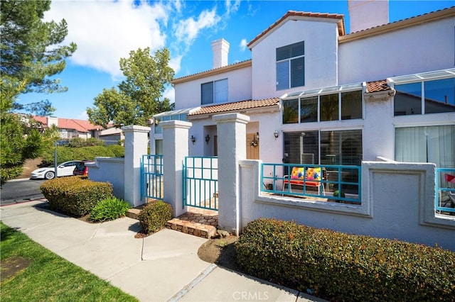 exterior space with a fenced front yard