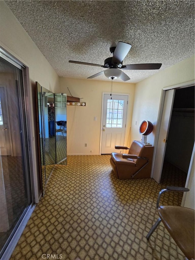 corridor with a textured ceiling