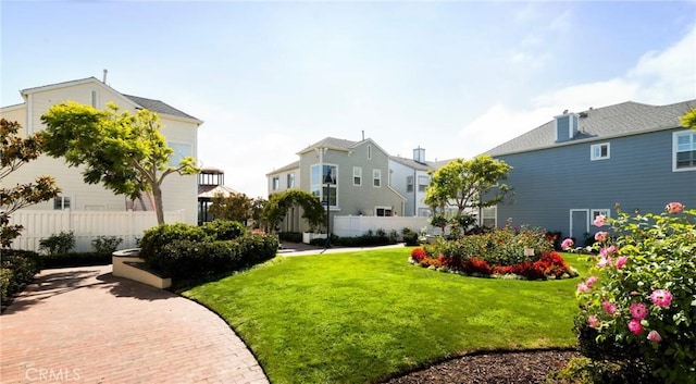 view of yard with fence