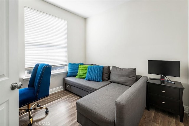 office featuring wood finished floors and baseboards