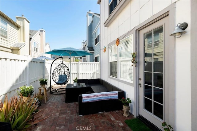 view of patio / terrace featuring a fenced backyard and outdoor lounge area