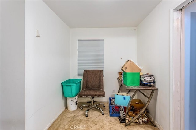 sitting room with carpet floors and baseboards