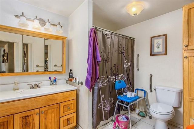 full bath with a shower with curtain, vanity, toilet, and tile patterned floors