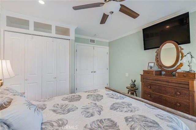 bedroom featuring a closet, a ceiling fan, and crown molding