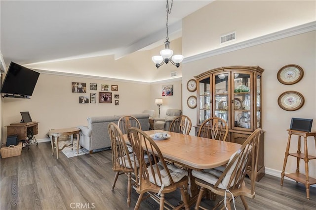 dining room with baseboards, visible vents, vaulted ceiling, and dark wood-type flooring