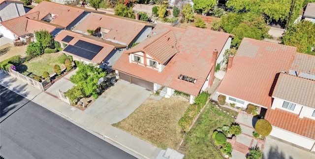 birds eye view of property with a residential view