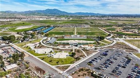 drone / aerial view featuring a mountain view