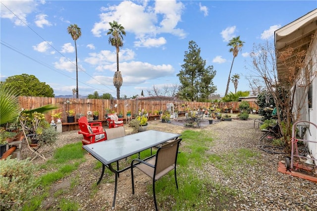 view of yard featuring a patio area and a fenced backyard