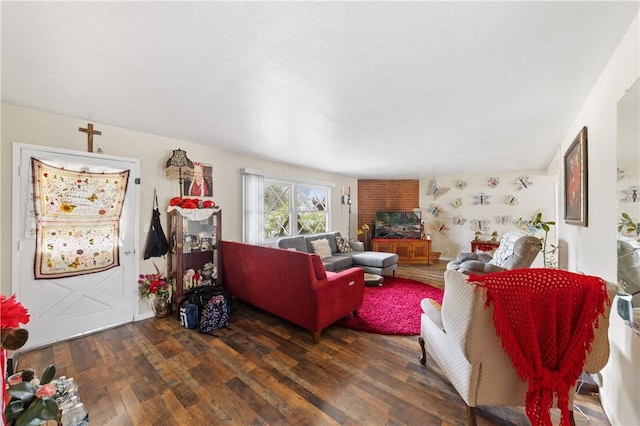 living area with wood-type flooring