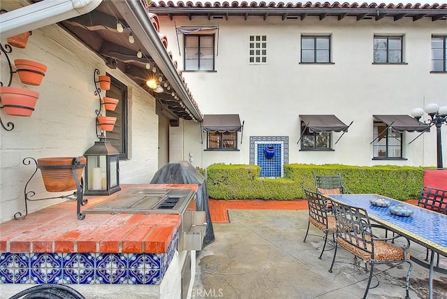 view of patio with outdoor dining area