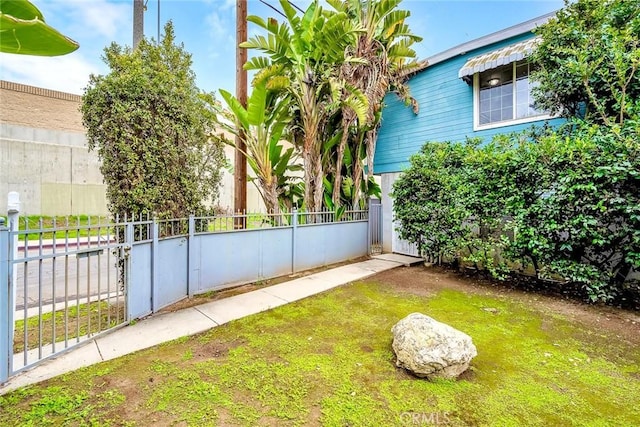 view of yard featuring fence