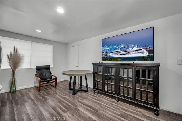 sitting room with recessed lighting, wood finished floors, and baseboards